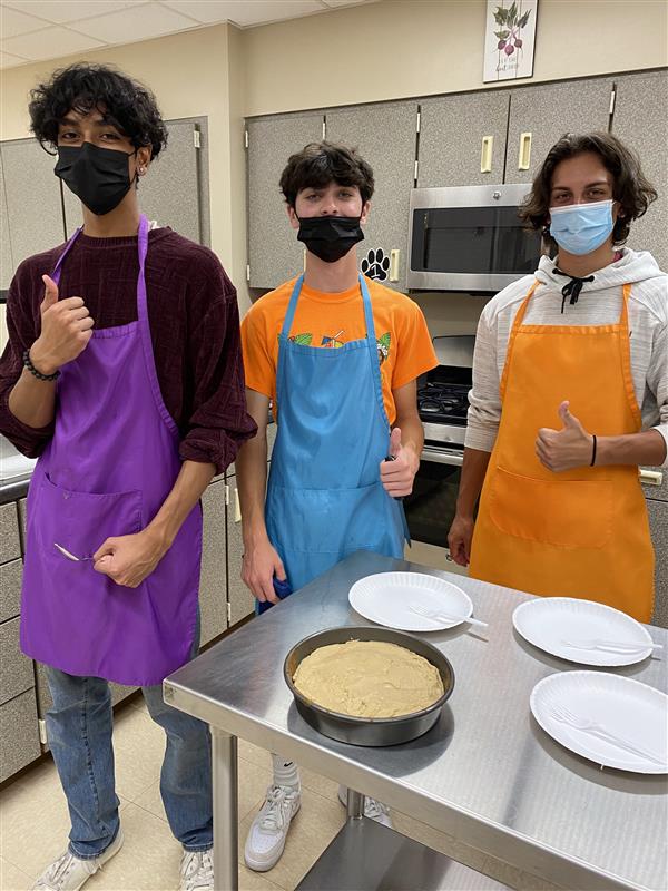 Students show off their baking skills.