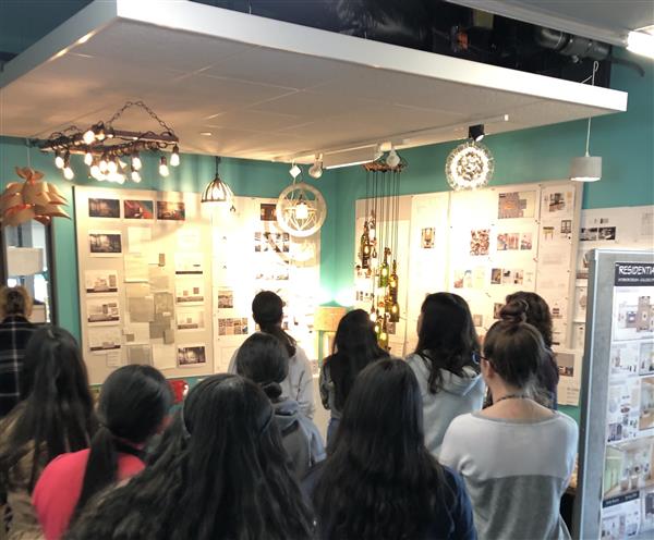 Students looking at home lighting choices.