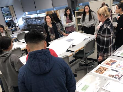 Looking at wallpaper samples.